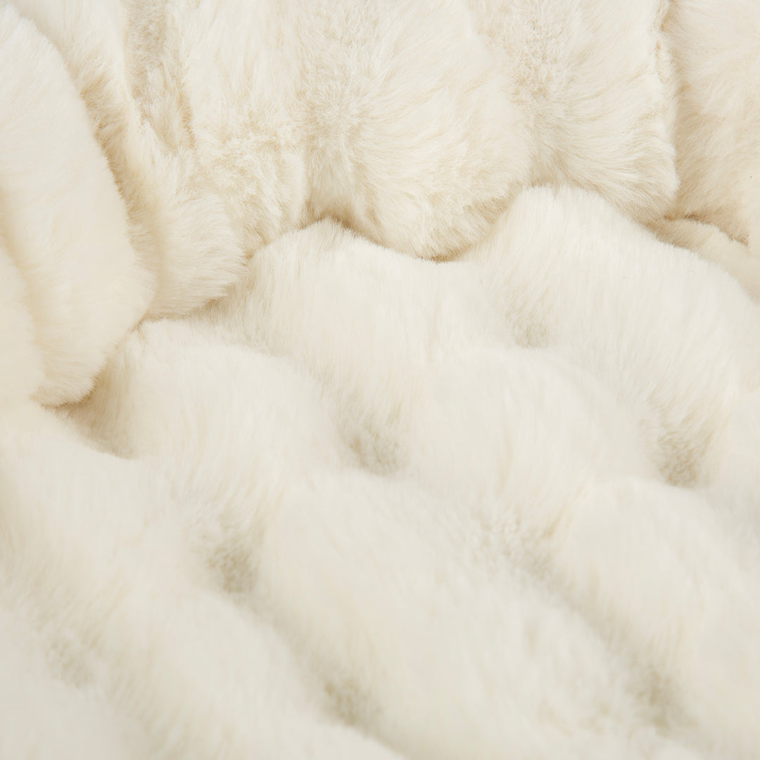 Close-up of cream fur texture on a cat tree tower