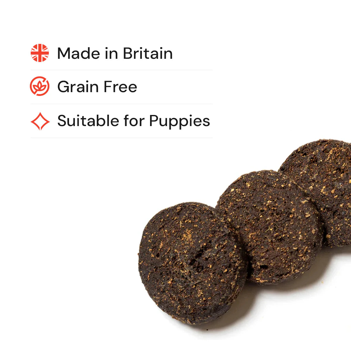 Gourmet burgers natural dog treats on a white background with text indicating 'Made in Britain', 'Grain Free', and 'Suitable for Puppies'.