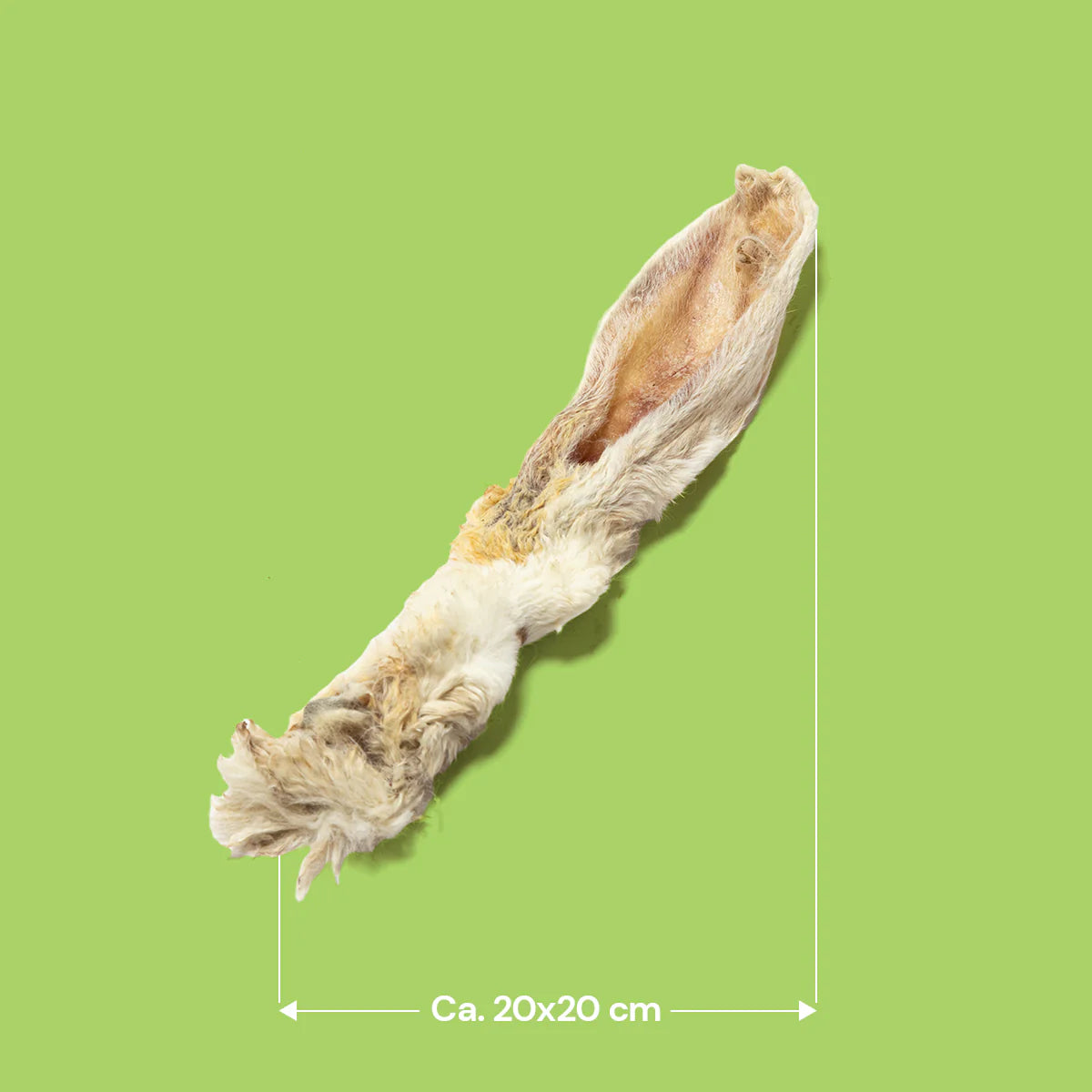 Dried hairy rabbit ears natural dog treats on a green background with dimensions indicated