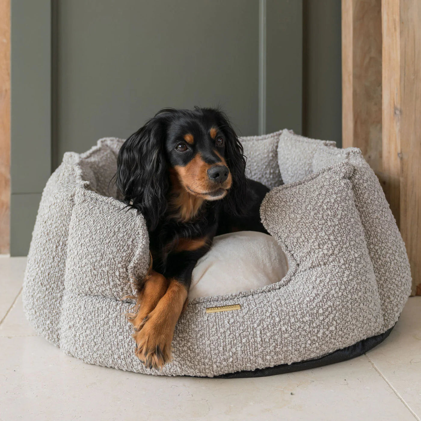 Lords & Labradors mink boucle high wall dog bed with supportive padded walls and removable inner pillow