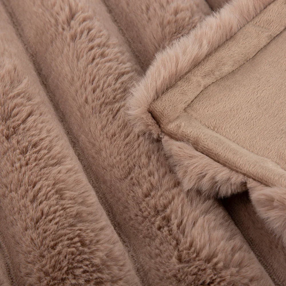 Close-up texture of taupe blanket fabric