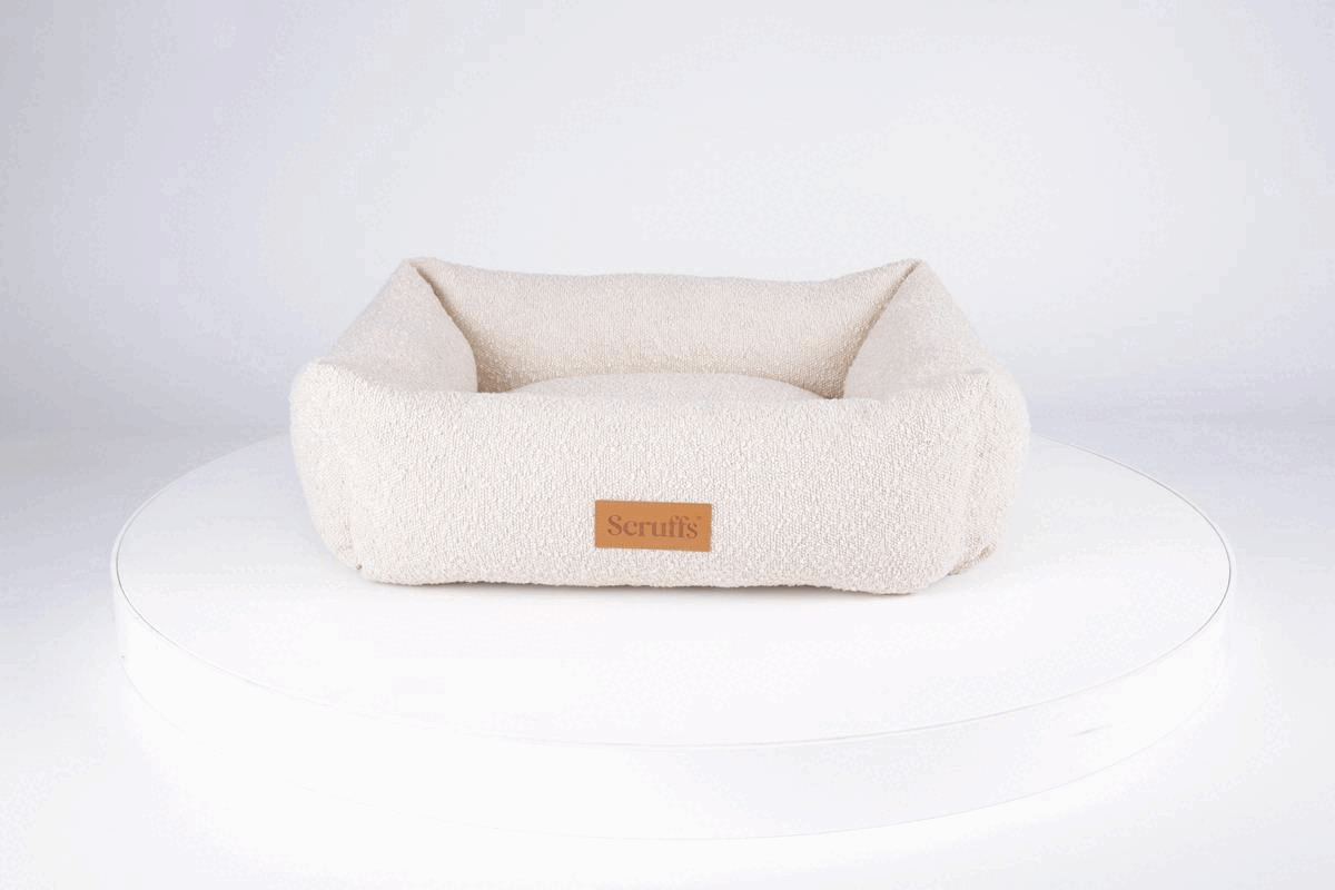 360 degree view of ivory boucle box dog bed showing one piece construction