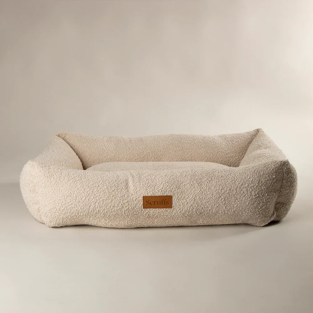 Scruffs Boucle Box Dog Bed in ivory with high supportive walls and plush interior