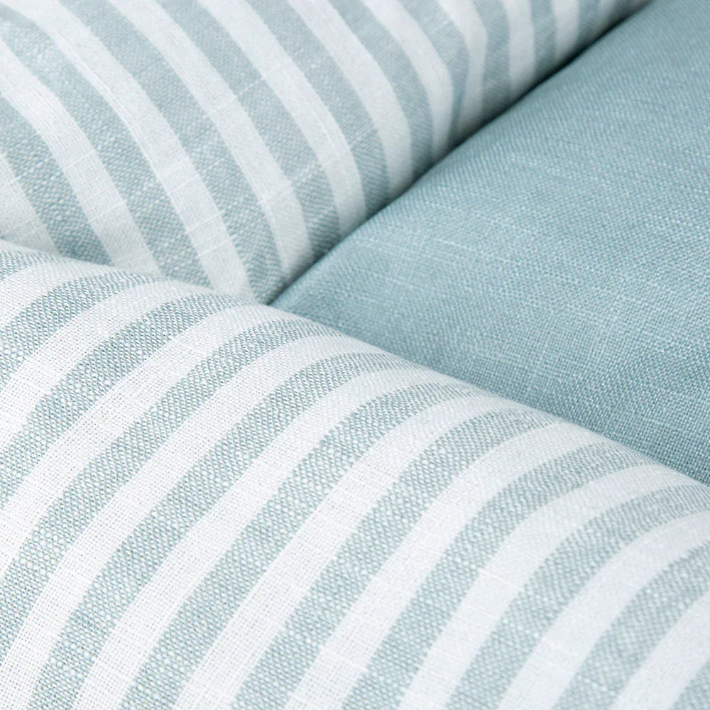 Close up of green striped fabric on Scruffs Coastal box dog bed