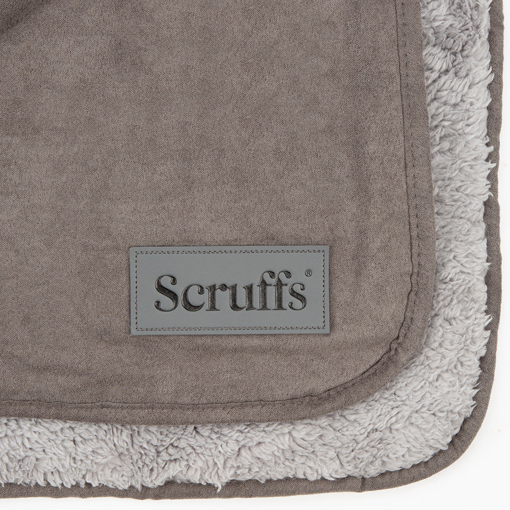 Close-up of Scruffs dog blanket showing faux suede and plush lining