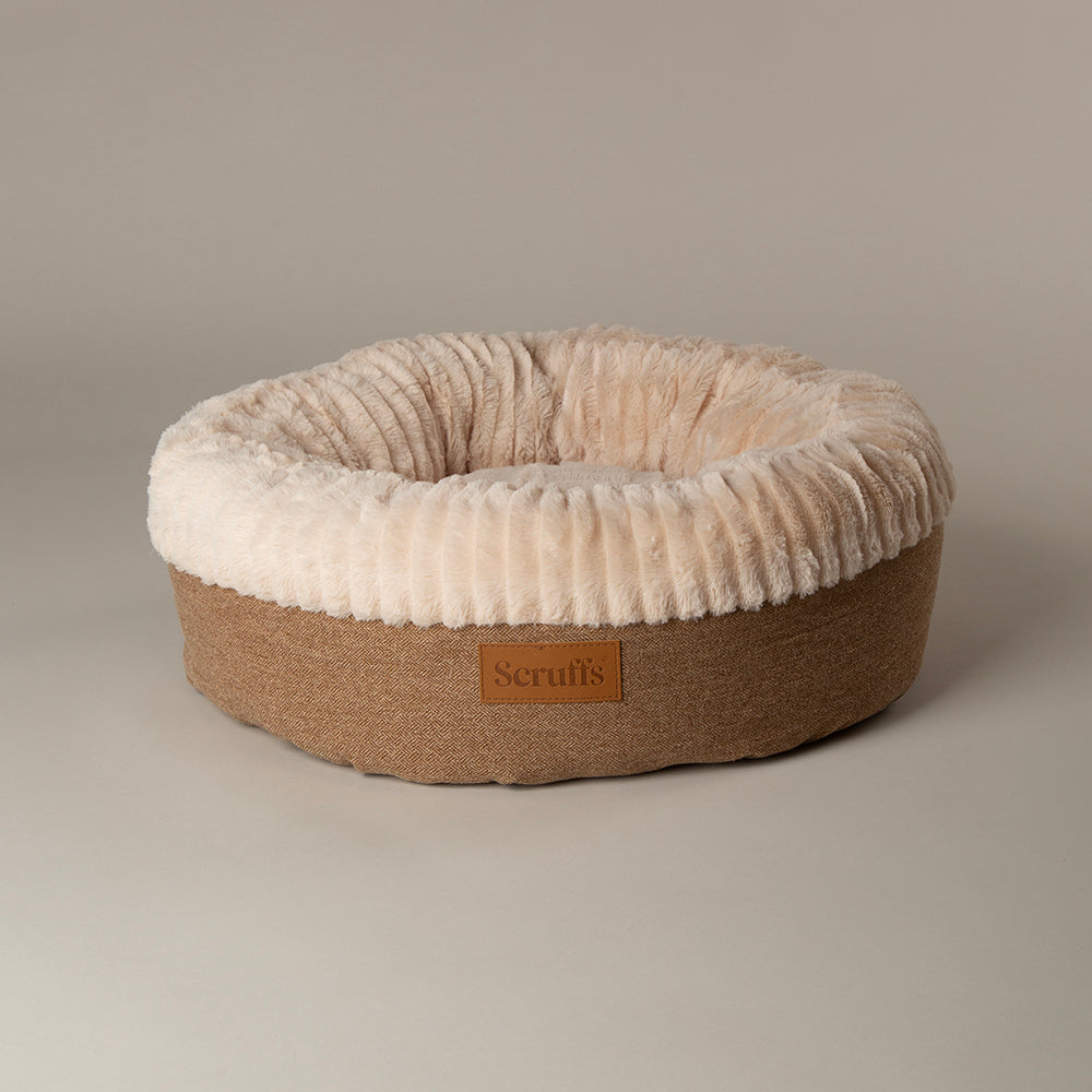 Scruffs Ellen donut dog bed in tan on a plain light background.