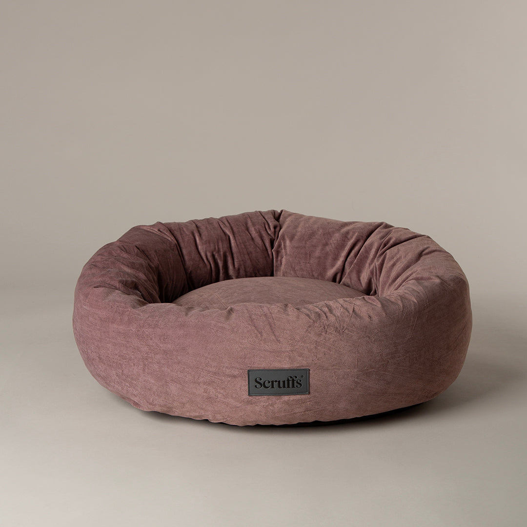 Scruffs Oslo donut dog bed in blush pink with velvet finish